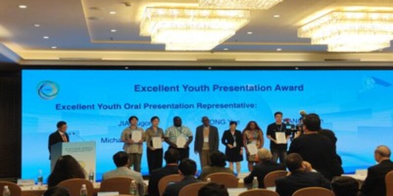Ms. Adipah receiving recognition